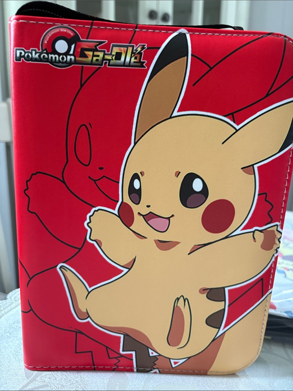 Pokemon Red Pikachu Zipper, wrist Strap & 50 Sleeves Brand New